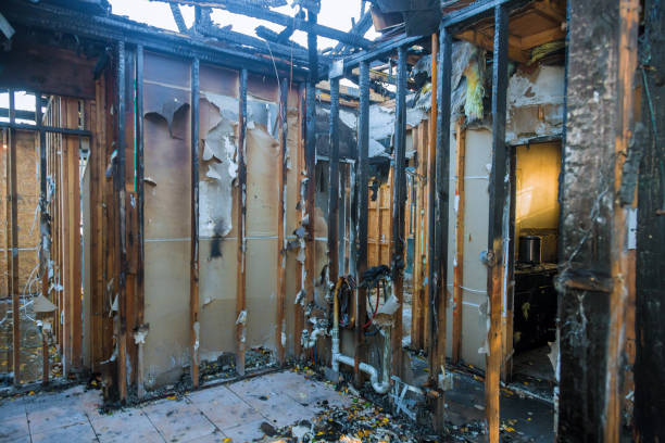 Professional Fire Damage Restoration technician working in Bingham Farms, MI